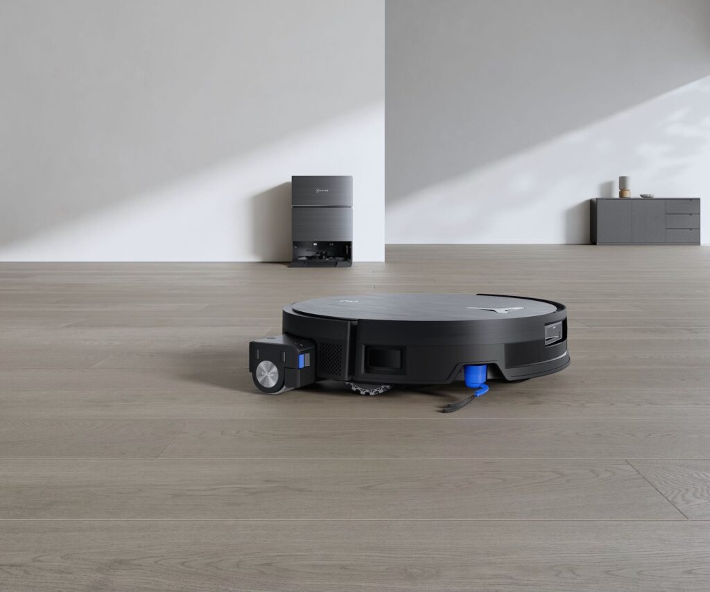 a robot vacuum cleaner on a wood floor