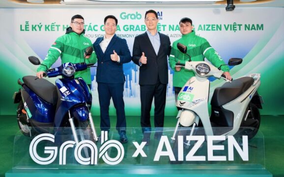Grab Việt Nam hợp tác AIZEN triển khai giải pháp thuê xe máy điện cho tài xế Grab